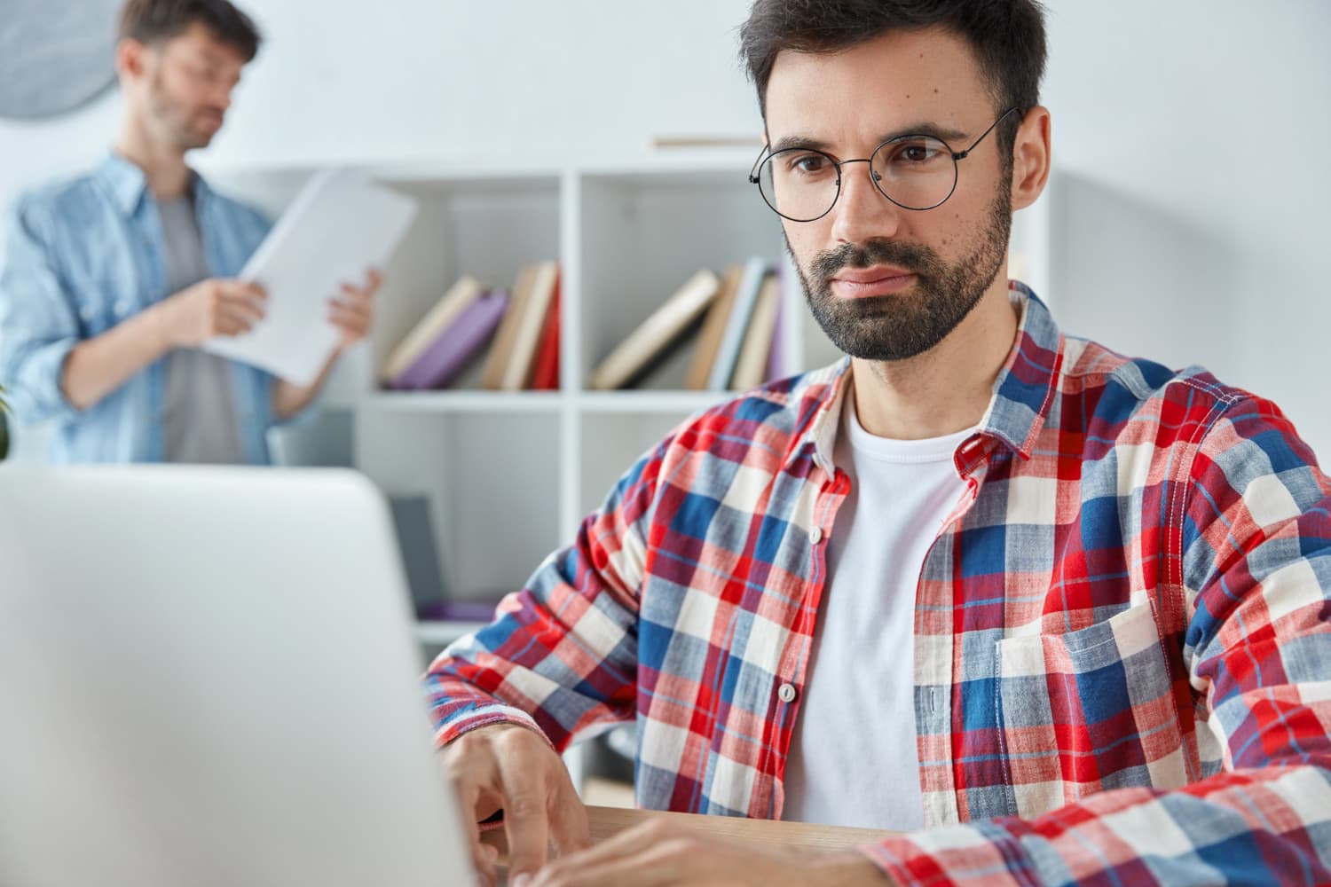 Person doing work on laptop